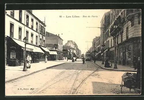 AK Les Lilas, Rue de Paris, Strassenbahnen