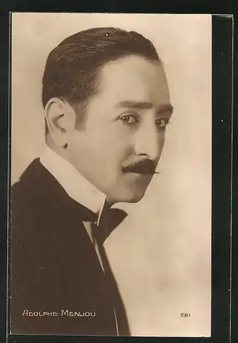 AK Schauspieler Adolphe Menjou mit ernsten Blick im Seitenprofil