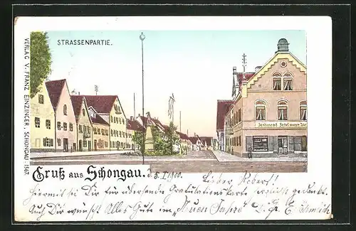 Goldfenster-AK Schongau, Strassenpartie mit Geschäft von Ferdinand Fedelmayr und Denkmal
