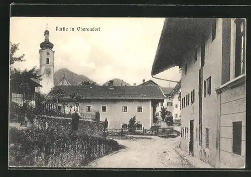 AK Oberaudorf, Strassenpartie mit Kirchblick