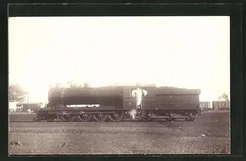 AK Lokomotive mit Waggons im Hintergrund