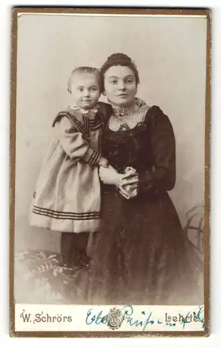 Fotografie W. Schrörs, Lehrte, Portrait Mutter mit Kind