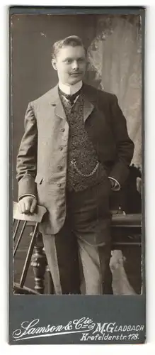 Fotografie Samson & Cie., M.-Gladbach, Portrait Herr in elegantem Anzug