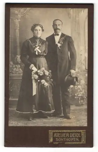 Fotografie Atelier Deidl, Sonthofen, Portrait bürgerlichesPaar in festlicher Garderobe