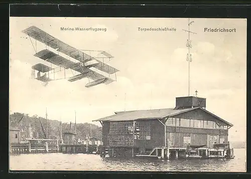 AK Kiel-Friedrichsort, Marine-Wasserflugzeug über der Torpedoschiesshalle
