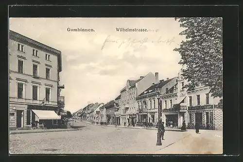 AK Gumbinnen, Wilhelmstrasse mit Geschäften