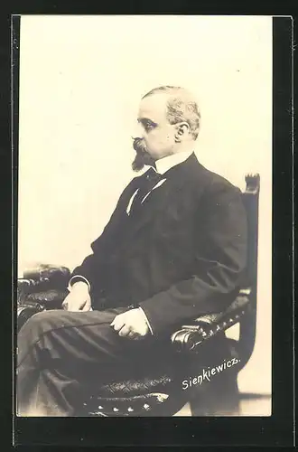 AK Portrait Henryk Sienkiewicz im Anzug auf einem Stuhl sitzend
