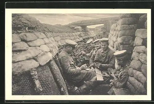 AK Ein Kartenspiel von Soldaten in Uniformen im Schützengraben