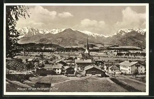 AK Kössen, Ortsansicht mit Kirche und Kaisergebirge