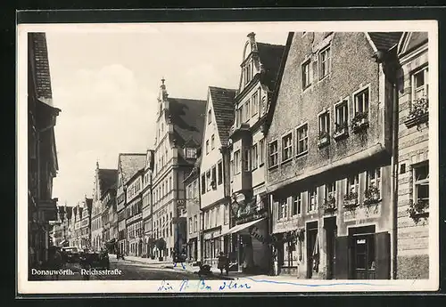 AK Donauwörth, Reichsstrasse, Häuserfassaden mit Geschäften