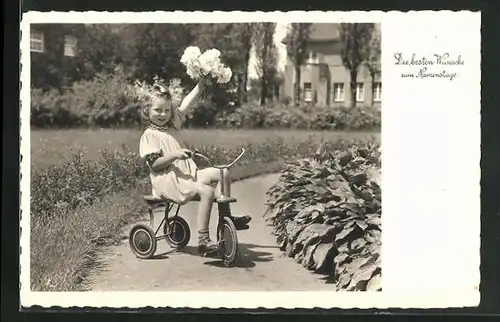AK Mädchen mit Dreirad gratuliert mit Blumen zum Namenstag, Spielzeug