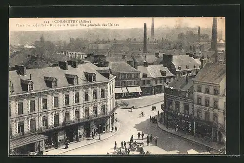 AK Commentry, Place du 14 Juillet, Rue de la Mine et Vue generale des Usines