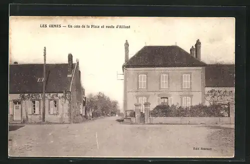 AK Les Ormes, Un coin de la Place et route d'Aillant