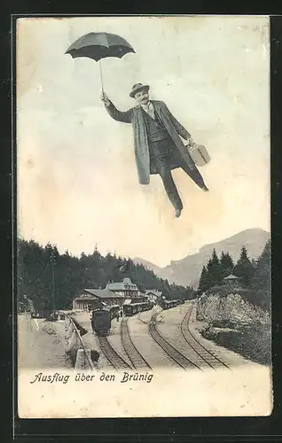 AK Brünig, Fliegender Mensch mit Schirm über dem Bahnhof