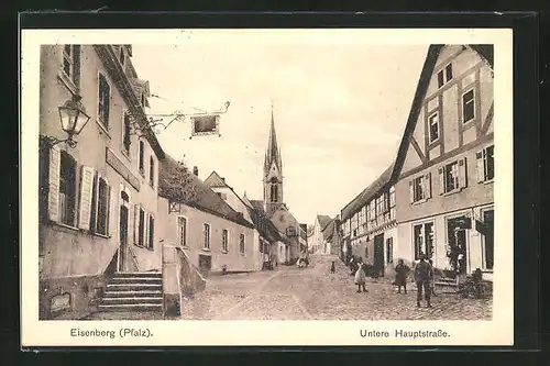 AK Eisenberg / Pfalz, Untere Hauptstrasse mit Blick zur Kirche