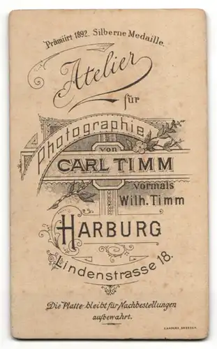 Fotografie Carl Timm, Harburg, Modisch frisierte Frau mit Halskette