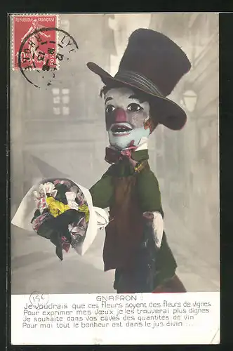 AK Puppe mit geschminktem Gesicht, Hut und Blumen, Gnafron, Puppentheater