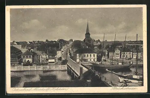 AK Neustadt / Holstein, Brückstrasse mit Blick zur Kirche