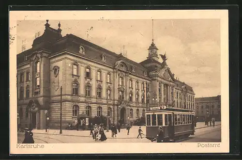 AK Karlsruhe, Strassenbahn zieht am Postamt vorbei