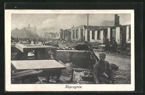 AK Kopczynce, Strassenpartie mit zerstörten Gebäuden