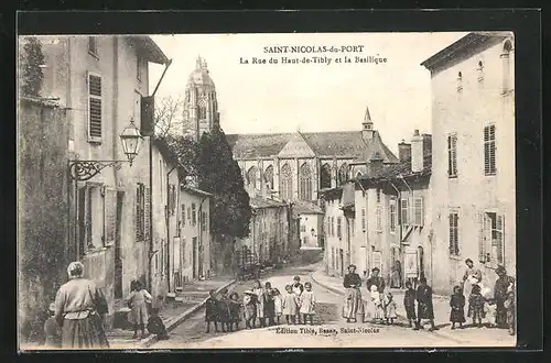AK Saint-Nicolas-du-Port, La Rue du Haut de Tibly et la Basilique