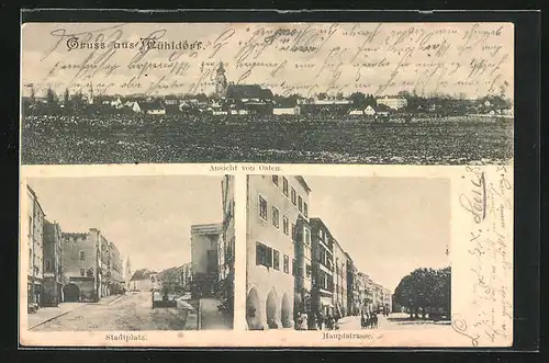 AK Mühldorf, Stadtplatz mit Kirche, Haupstrasse mit Gebäudezeile, Ortansicht von Osten