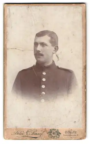 Fotografie Atelier G. Penzel, Görlitz, Schützenstr. 2, Portrait Soldat in Uniform mit Schnurbart