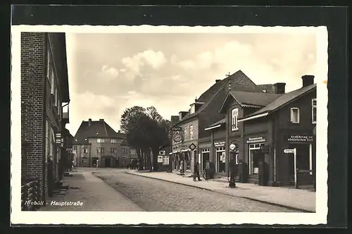 AK Niebüll, Hauptstrasse mit Optiker