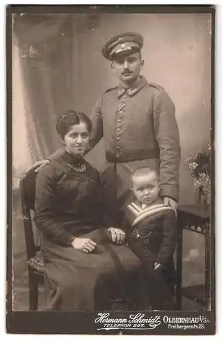 Fotografie Hermann Schmidt, Olbernhau i. Sa., Freibergerstr. 28, Portrait Ufz. in Feldgrau Uniform mit Ordensband