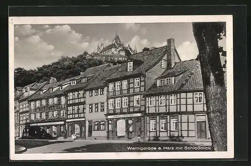 AK Wernigerode a. Harz, Strasse Schöneck mit Schlossblick