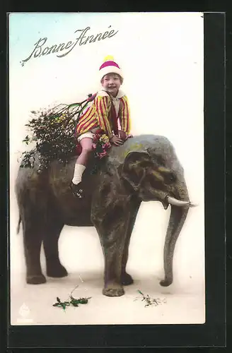 AK Mädchen reitet auf einem kleinen Elefanten, Bonne Année!