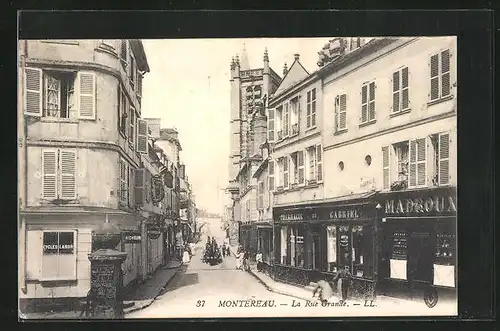 AK Montereau, La Rue Grande, Strassenpartie