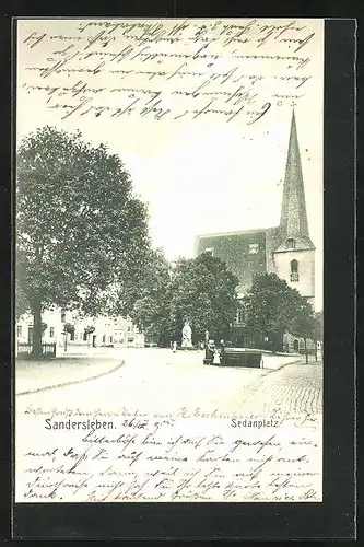 AK Sandersleben, Sedanplatz mit Kirche und Brunnen