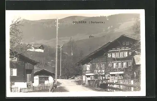 AK Goldern, Dorfpartie mit Blick hinauf auf die Berge