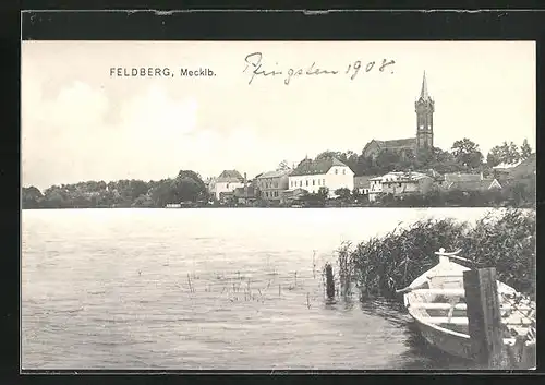 AK Feldberg / Mecklb., Teilansicht mit Kirche und Boot