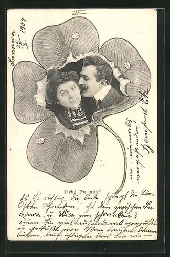 AK Paar küsst sich in einem Kleeblatt, Fotomontage