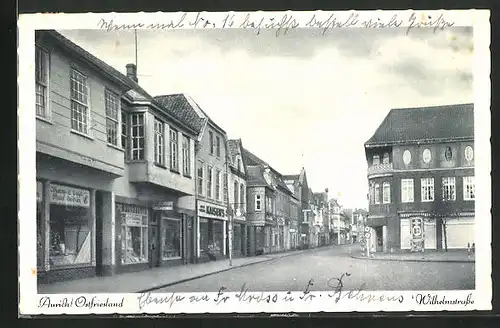 AK Aurich /Ostfriesland, Wilhelmstrasse mit Geschäften