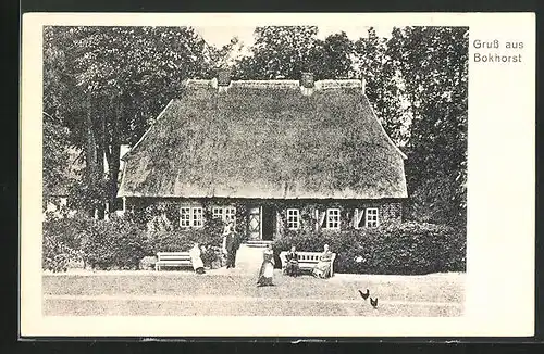 AK Bokhorst, Personen vor einem teetgedecktem Haus