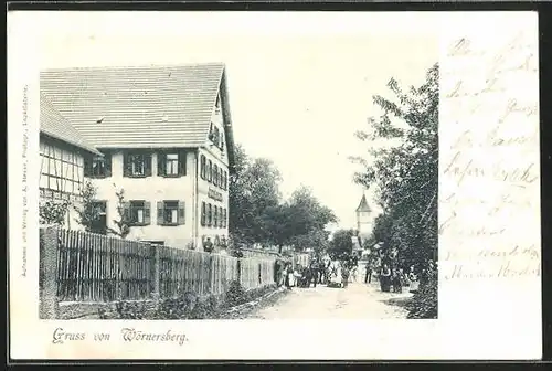 AK Wörnersberg, Strassenpartie mit Gasthaus gegen Kirchturm