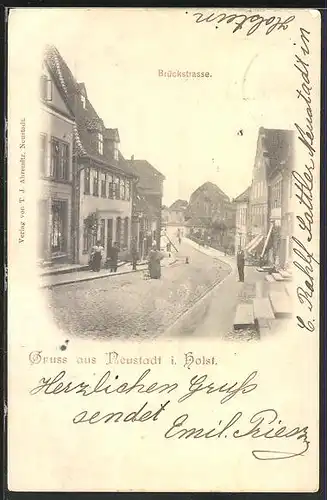 AK Neustadt / Holstein, Brückstrasse mit Geschäften und Passanten