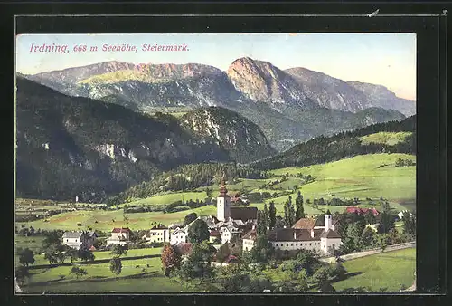 AK Irdning in der Steiermark, Blick zur Kirche im Ort und gegen das Gebirge