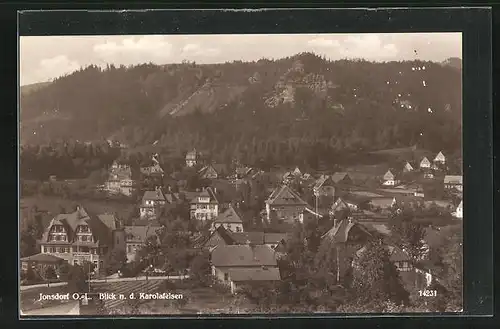 AK Jonsdorf /O.-L., Ortsansicht gegen Karolafelsen