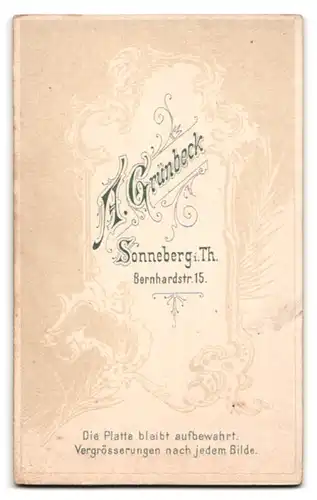 Fotografie Alb. Grünbeck, Sonneberg, Bernhardstr. 15, Portrait niedlicher Bube mit Fliege im Jackett