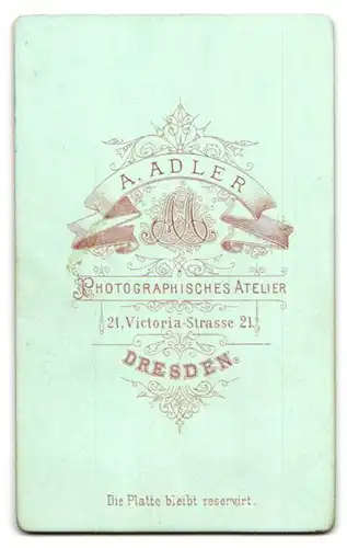 Fotografie A. Adler, Dresden, Victoriastr. 21, Portrait vollbärtiger Herr mit Zwicker im Ausgehrock