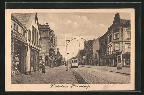 AK Wilhelmshaven, Bismarckstrasse mit Geschäften und Strassenbahn