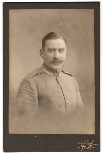 Fotografie C. Bock, Anklam, Portrait Ufz. in Feldgrau Garde Uniform mit Oberlippenbart