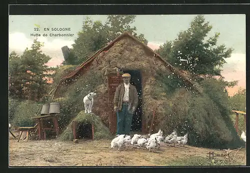 AK En Sologne, Hutte de Charbonnier, Köhler in seiner Hütte