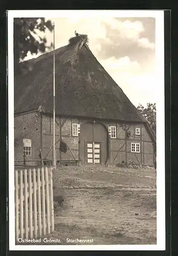 AK Grömitz, Bauernhaus mit Storchennest