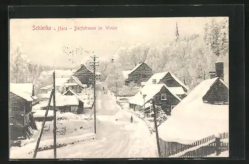 AK Schierke /Harz, Dorfstrasse im Winter