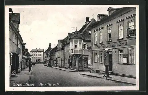 AK Usingen i. Taunus, Horst Wessel Strasse mit Gasthaus zur goldenen Sonne